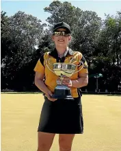  ??  ?? Nicole Toomey, with her singles trophy, failed to make it through qualificat­ion in the national pairs in Auckland yesterday.