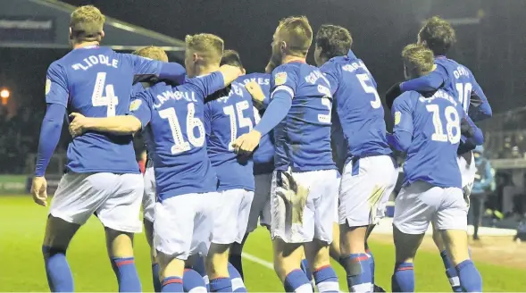  ??  ?? ■ Carlisle United celebrate Danny Grainger’s fourth goal for the Cumbrians against Colchester in League Two. Mark Fuller