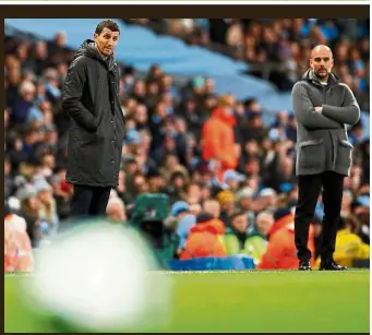  ?? — Reuters ?? Spanish eyes: Manchester City manager Pep Guardiola (right) and his Watford counterpar­t Javi Gracia looking at the ball as it goes out of play during an English Premier League match at the Etihad on March 9. City and Watford will contest the FA Cup final at Wembley tomorrow.