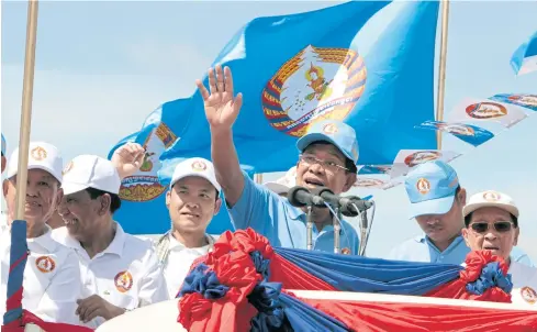  ?? AP ?? Cambodian Prime Minister Hun Sen waves from a truck as he leads a rally in Phnom Penh on Friday, ahead of Sunday’s local elections.