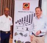  ??  ?? Akinola and Buzon during the presentati­on on Buszon Screw-jack in Lagos