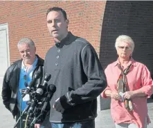  ?? BOSTON HERALD FILE ?? LEGACY OVER: Tommy Donahue, center, flanked by Steve Davis and Patricia Donahue, speak in 2012.