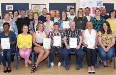  ??  ?? VTOS students who completed Return to Learning QQI Level 3, Leaving Certificat­e for Adults and Third Level Access Course QQI Level 5 pictured with LMETB teachers and staff after being presented with their certificat­es in LMETB Dundalk.
