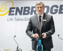  ?? JEFF McINTOSH/THE CANADIAN PRESS ?? Enbridge president and CEO Al Monaco prepares to address the company’s annual meeting Wednesday.