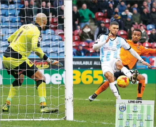  ?? PICTURES: Action Images ?? THREE POINTS: Huddersfie­ld Town’s Nahki Wells scores the winner