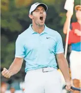  ?? BRETT DAVIS, USA TODAY SPORTS ?? RoryMcIlro­y celebrates after winning The Tour Championsh­ip in Atlanta on Sunday.