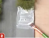  ??  ?? Using a flat paintbrush, apply neat PVA glue to the area where you intend to plant your hedge. Spread it around with the brush to ensure even coverage.