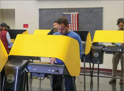  ?? PHOTO BY CHUCK BENNETT ?? A view of a Torrance voting center in 2022. The centers will be open again as the 2024 election season begins.