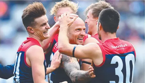  ?? Picture: Getty Images ?? The Demons have a host of players available for Friday’s clash with the Cats, including former skipper Nathan Jones (centre).