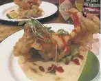  ??  ?? Soft shell crab taco.