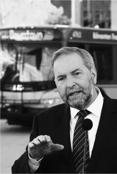  ?? Sean Kilpat rick / The Cana dian Press ?? NDP Leader Tom Mulcair in Edmonton on Friday had to admit he knew absolutely
nothing about the latest candidate scandal a reporter was asking him about.