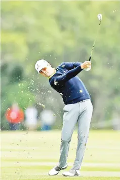  ?? — AFP photo ?? Zach Johnson plays his second shot on the first hole during the second round of the Valero Texas Open at TPC San Antonio AT&T Oaks Course on April 19, 2018 in San Antonio, Texas.