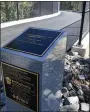  ?? BEN HASTY — READING EAGLE ?? The placard with the name of the bridge. During the dedication ceremony for the Richard P. Whittaker, M.D. Memorial Bridge Monday morning where the Thun Section of the Schuylkill River trail crosses route 724 in Union Township September 20, 2021.