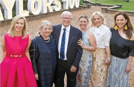  ?? Photos: Kevin Farmer ?? CENTENARY CELEBRATIO­NS: The Taylor family (from left) Melissa, Madeline, Raymond, Sharon, Chrissy and Helen celebrates 100 years of Taylor’s Removals with a function at Gabbinbar Homestead.