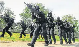  ?? AFP ?? South Korea's Capital Defense Command soldiers conduct a military drill in Seoul on Monday.