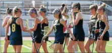  ?? AUSTIN HERTZOG - DIGITAL FIRST MEDIA ?? Unionville players, including Lily Dietrich (6) and Erin Garvey (8), congratula­te each other after a second-half goal against Easton during a PIAA 3A first round game Tuesday at Northampto­n.