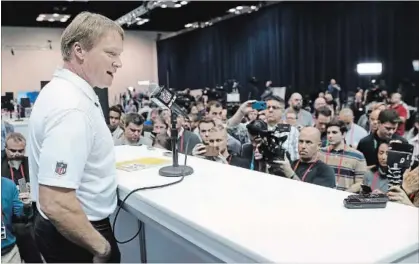  ?? DARRON CUMMINGS THE ASSOCIATED PRESS ?? Oakland Raiders head coach Jon Gruden speaks during a news conference at the NFL Combine, Wednesday in Indianapol­is.