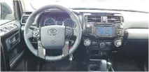  ??  ?? The 4Runner Trail Edition offers a big chunky steering wheel, big blocky centre stack and big, well- marked knobs and buttons.