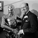  ?? Photograph: AP ?? ‘I didn’t have any idea what the sound should be’ … John Williams with Star Wars character C-3PO in 1980.