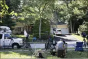  ?? MARK LENNIHAN — THE ASSOCIATED PRESS FILE ?? Members of the media set up in front of the home of a federal judge in North Brunswick, N.J., on July 20, 2020. A man disgruntle­d with U.S. District Judge Esther Salas came to her New Jersey home disguised as a deliveryma­n and fatally shot her 20-year-old son while wounding her husband.