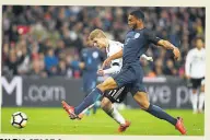  ??  ?? ON BIG STAGE Gomez tackles Germany’s Timo Werner (above) and battles with Everton’s Wayne Rooney (below)