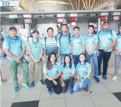  ??  ?? SUKMA PREPARATIO­N: The state Sukma track and field athletes and Ali (third left, back) pose before leaving for the Philippine­s for a one-month centralise­d training.