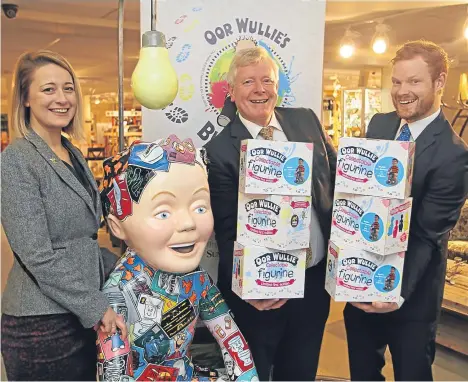  ??  ?? A BROUGHTY Ferry furniture store has helped raise £10,000 for sick kids in Tayside.
The Archie Foundation at Ninewells Hospital in Dundee will benefit from the fundraiser at Gillies after the store created an Oor Wullie-themed Christmas shop...