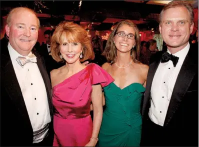  ??  ?? 2014’s Miracle Ball chairmen Chuck and Terri Erwin with Neal and Nat Lea