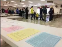  ?? EVAN BRANDT — DIGITAL FIRST MEDIA ?? Turnout was brisk Tuesday for the two Douglass (Mont.) Township voting districts that cast their ballots at the Gilbertsvi­lle Firehouse.