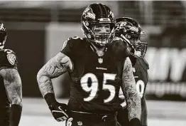  ?? Terrance Williams / Associated Press ?? A bad four-year stretch in Denver left Derek Wolfe disillusio­ned. Since signing a one-year deal with Baltimore, the defensive end found his love for football.