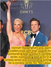  ?? Photos by AP and Reuters ?? Hannah Waddingham and Jason Sudeikis pose with their awards for outstandin­g lead actress in comedy series, outstandin­g lead actor in a comedy series and outstandin­g writing for a comedy series, for ‘Ted Lasso’.