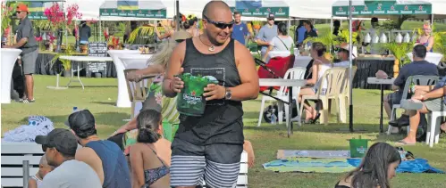  ?? Photo: Charles Chambers ?? People enjoying the food and music festival at Denarau on October 6, 2018.