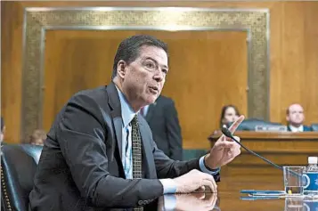  ?? SHAWN THEW/EPA ?? FBI Director James Comey told senators that the idea he affected the election makes him “mildly nauseous.”