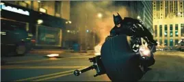  ?? WARNER BROS. ?? Christian Bale as Batman in a scene from “The Dark Knight.”