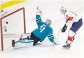  ?? EZRA SHAW/GETTY IMAGES ?? The Panthers’ Nick Bjugstad scores a goal on Sharks goalie Martin Jones in San Jose on Thursday night.