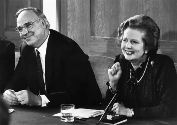  ??  ?? Kohl with Margaret Thatcher at a press conference in 1983 (Getty)