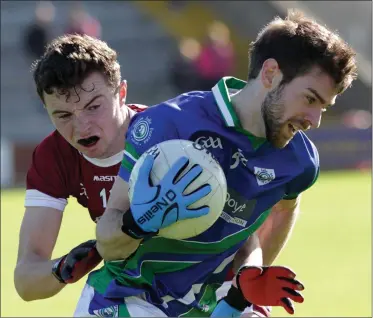  ??  ?? Glynn-Barntown wing-back Nigel Usher is tackled by Rory O’Connor of St. Martin’s.