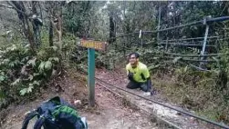  ??  ?? ADAM ketika misi pertamanya di Gunung Kinabalu.
