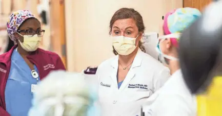  ?? JOE ELLIS/UMMC COMMUNICAT­IONS ?? Dr. Rachael Morris, a maternal-fetal medicine specialist and associate professor in the Department of Obstetrics and Gynecology at the University of Mississipp­i Medical Center, leads rounds on the Labor and Delivery floor.