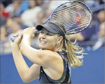  ?? [KATHY WILLENS/THE ASSOCIATED PRESS] ?? Unseeded Maria Sharapova defeated second-seeded Simona Halep in three sets Monday at the US Open in her first major tournament since 2016.