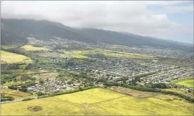 ?? The Maui News / MATTHEW THAYER photo ?? In Maui County, most homes sold in January were in Central Maui, according to a recent report. The median sales price for a single-family home was $1.16 million. This photo of Waikapu was taken in 2020.