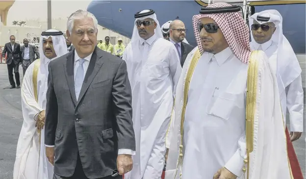  ?? PICTURE: AP ?? 0 Rex Tillerson arrives in Doha, which is his second stop on a shuttle-diplomacy circuit that is also expected to take him to Saudi Arabia