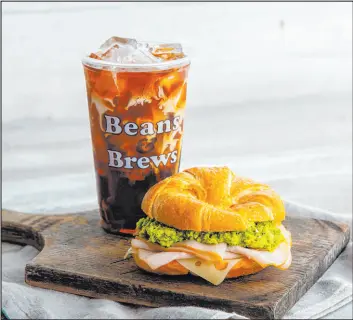  ?? Beans & Brews ?? The menu at the first Las Vegas location of Beans & Brews Coffee House includes high-altitude roasted coffees, sandwiches and breakfast items.