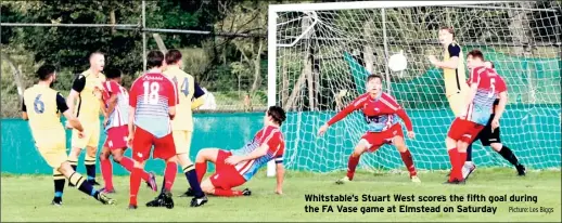  ?? Picture: Les Biggs ?? Whitstable’s Stuart West scores the fifth goal during the FA Vase game at Elmstead on Saturday