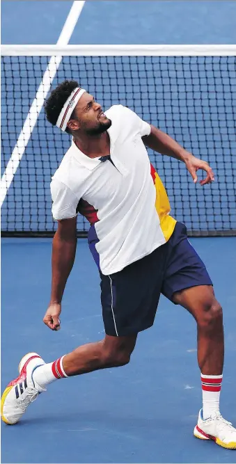  ?? AL BELLO / GETTY IMAGES ?? Jo-Wilfried Tsonga celebrates after winning his first-round U.S. Open match against Marius Copil on Monday in New York. The Frenchman will next face Denis Shapovalov, from Richmond Hill, Ont.