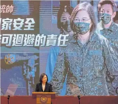  ?? ?? BATTENING DOWN: Taiwan President Tsai Ing-wen appears at a news conference in Taipei on Dec 27, 2022, after extending compulsory military service to one year.