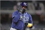  ?? GENEVA HEFFERNAN — THE ASSOCIATED PRESS ?? The Rays’ Isaac Paredes celebrates after hitting a solo home run against the Rockies during the eighth inning on Saturday in Denver.