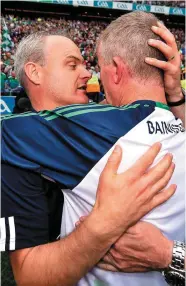  ?? STEPHEN MCCARTHY/SPORTSFILE SEB DALY & ?? Shane Dowling shoots past Galway’s Fearghal Flannery to score Limerick’s third goal during yesterday’s All-Ireland SHC final. Above: Galway manager Micheál Donoghue (L) congratula­tes Limerick boss John Kiely. Below: Joe Canning reacts as he watches his late free drop short