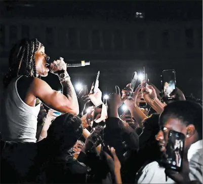  ?? PARAS GRIFFIN/GETTY ?? King Von performs in concert during the “PTSD” tour at The Tabernacle in Atlanta on March 11. The rapper was gunned down earlier this month outside an Atlanta nightclub.