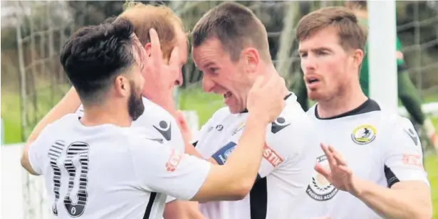  ?? James Smith ?? Widnes – pictured celebratin­g a goal against Glossop North End earlier in the season – were edged out by Clitheroe last Saturday.